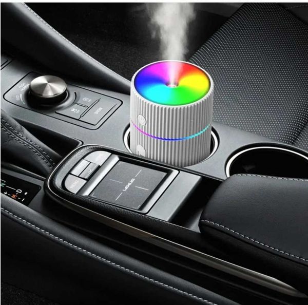 Compact USB-powered mini atomizer with colorful running lights for car humidification and heavy fog output